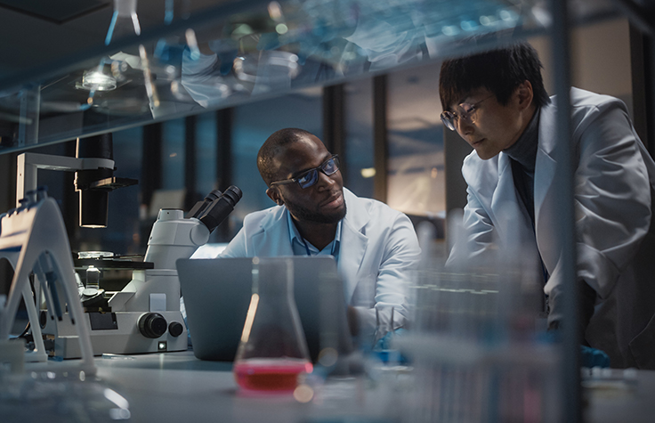 research scientists at lab bench